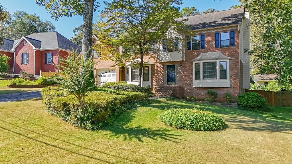 5 bedroom, 3 bathroom, 2,771 sq ft single family residence sold at 921 Cedar Trace, Lilburn, GA 30047