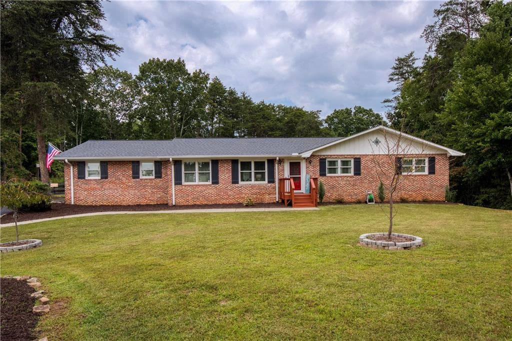 4 bedroom, 2 bathroom, 2,896 sq ft single family residence sold at 102 Pine Lake Drive, Cumming, GA 30040