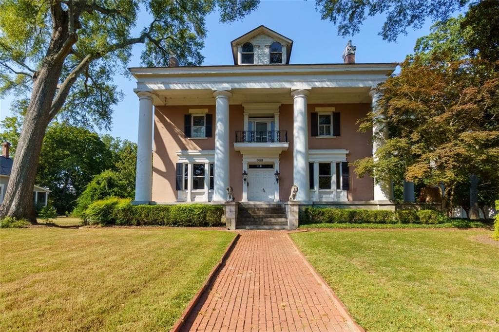 6 bedroom, 5 bathroom, 7,704 sq ft single family residence sold at 303 KENNESAW Avenue, Marietta, GA 30060