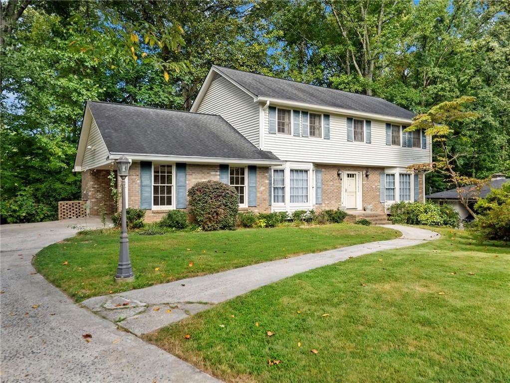4 bedroom, 3 bathroom, 2,376 sq ft single family residence sold at 654 Grove Parkway, Marietta, GA 30067