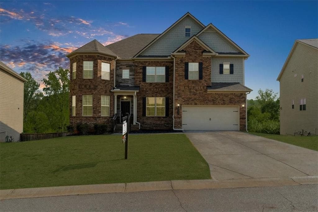 5 bedroom, 4 bathroom, 5,736 sq ft single family residence sold at 5435 Mirror Lake Drive, Cumming, GA 30028
