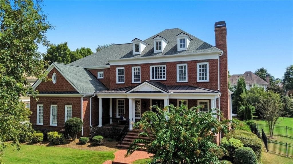 6 bedroom, 7 bathroom, 7,782 sq ft single family residence sold at 1094 Meadow Bluff Terrace, Suwanee, GA 30024