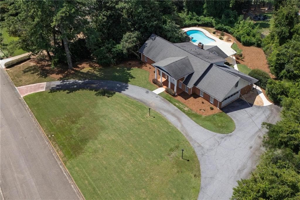 4 bedroom, 4 bathroom, 5,658 sq ft single family residence sold at 7570 Chaparral Drive, Atlanta, GA 30350