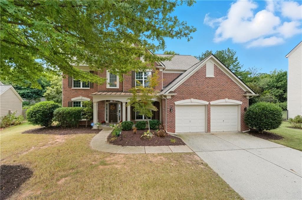 4 bedroom, 3 bathroom, 2,820 sq ft single family residence sold at 4040 Yakutia Place, Cumming, GA 30040