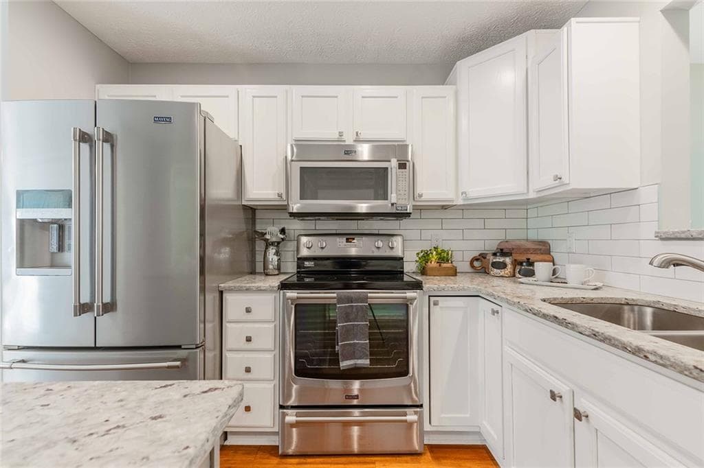 3 bedroom, 2 bathroom, 1,238 sq ft single family residence sold at 61 Griggs Street, Marietta, GA 30064