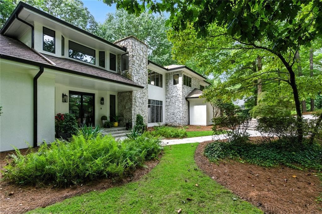 6 bedroom, 7 bathroom, 7,906 sq ft single family residence sold at 5410 New Wellington Close, Atlanta, GA 30327