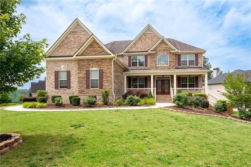 5 bedroom, 4 bathroom, 3,778 sq ft single family residence sold at 6585 Canyon Cove, Cumming, GA 30028