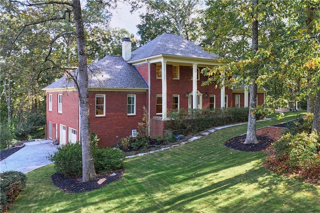 6 bedroom, 4 bathroom, 5,956 sq ft single family residence sold at 5157 Forest Brook Parkway, Marietta, GA 30068