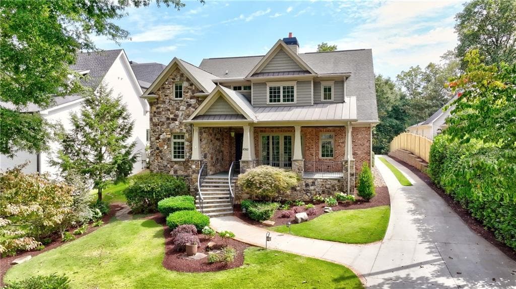 5 bedroom, 7 bathroom, 5,584 sq ft single family residence sold at 4745 E Conway Drive, Atlanta, GA 30327