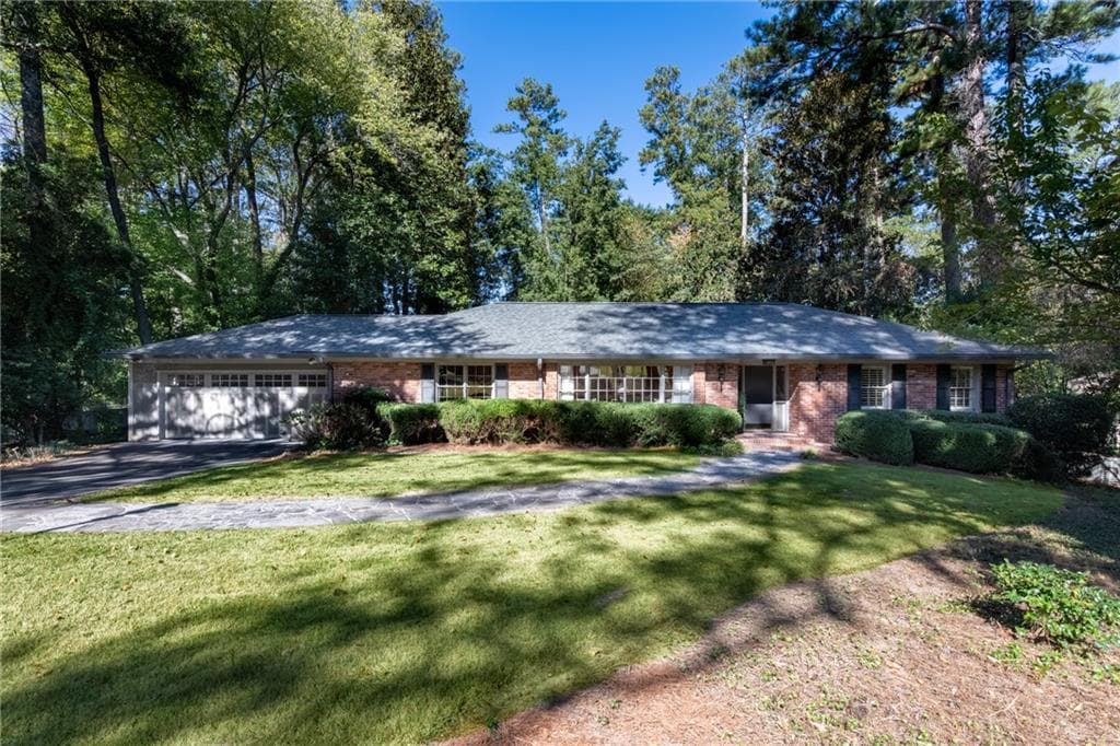 3 bedroom, 3 bathroom, 3,347 sq ft single family residence sold at 3144 E Wood Valley Road, Atlanta, GA 30327
