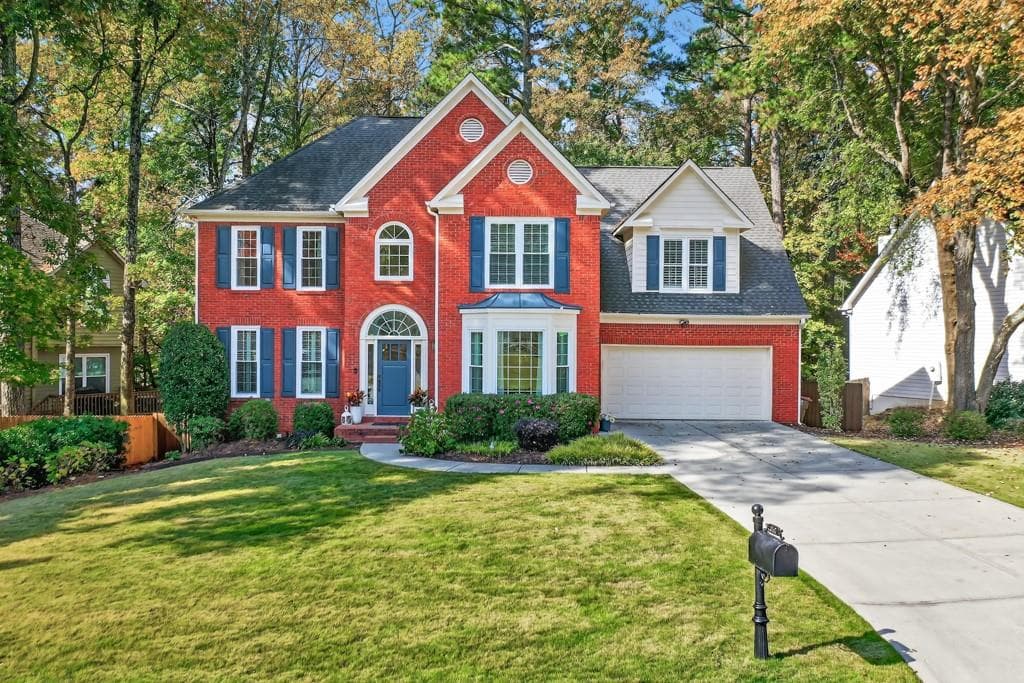 5 bedroom, 4 bathroom, 3,933 sq ft single family residence sold at 310 Creekside Drive, Alpharetta, GA 30022