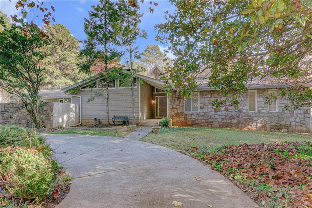 4 bedroom, 4 bathroom, 4,998 sq ft single family residence sold at 5435 High Point Road, Atlanta, GA 30342