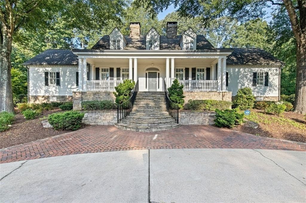 4 bedroom, 5 bathroom, 6,661 sq ft single family residence sold at 1335 Marietta Country Club Drive, Kennesaw, GA 30152