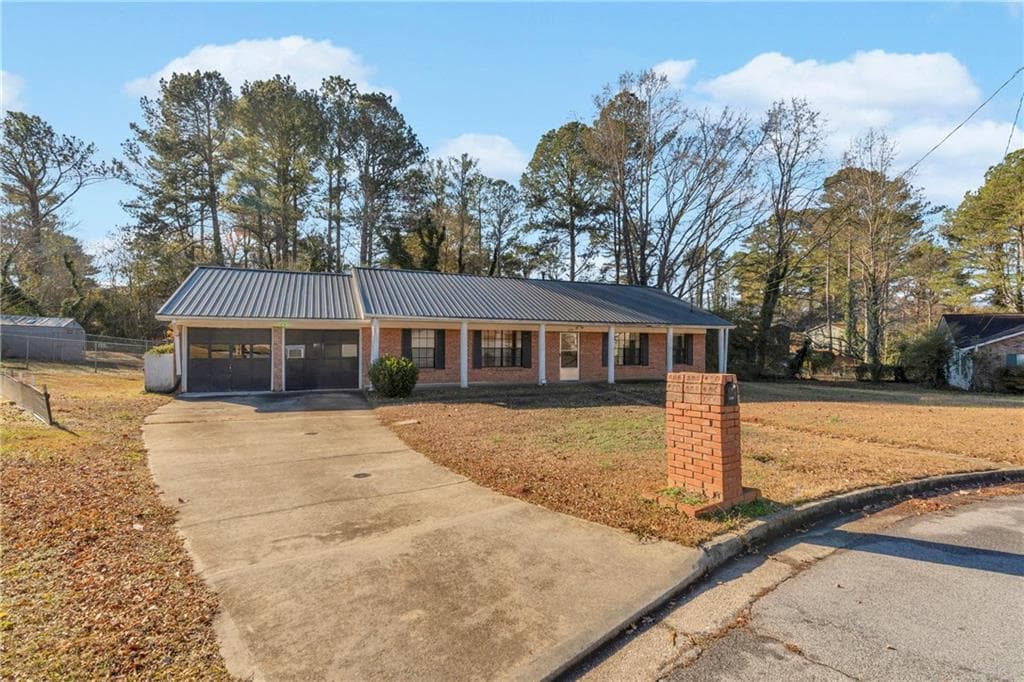 4 bedroom, 2 bathroom, 1,698 sq ft single family residence sold at 1999 Sewing Circle, Lithonia, GA 30058