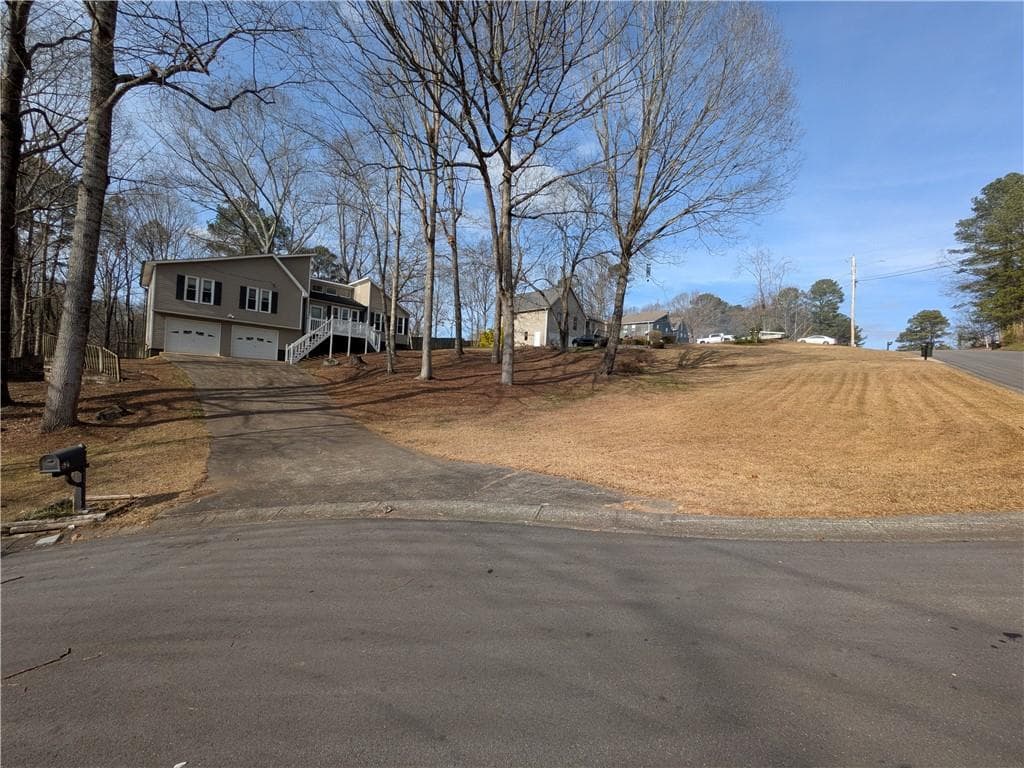 3 bedroom, 2 bathroom, 2,045 sq ft single family residence sold at 521 Penny Lane, Woodstock, GA 30188