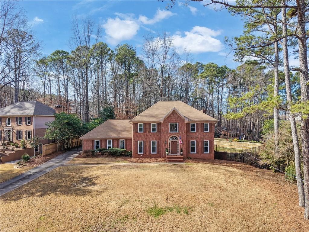 5 bedroom, 4 bathroom, 2,982 sq ft single family residence sold at 5809 Alvaton Court, Peachtree Corners, GA 30092