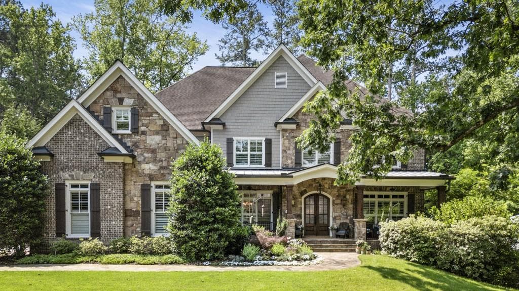 5 bedroom, 6 bathroom, 6,424 sq ft single family residence sold at 157 Lake Forrest Lane, Atlanta, GA 30342