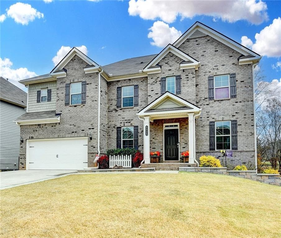 6 bedroom, 5 bathroom, 5,328 sq ft single family residence sold at 5525 Mirror Lake Drive, Cumming, GA 30028
