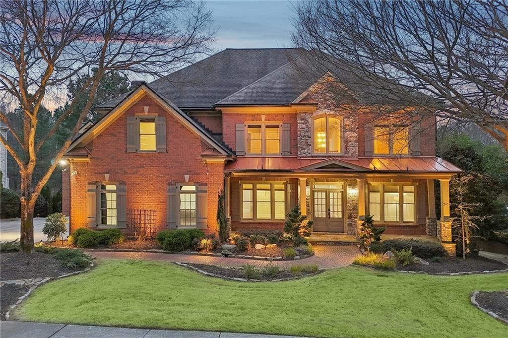 6 bedroom, 7 bathroom, 6,928 sq ft single family residence sold at 1609 Heathrow Drive, Cumming, GA 30041