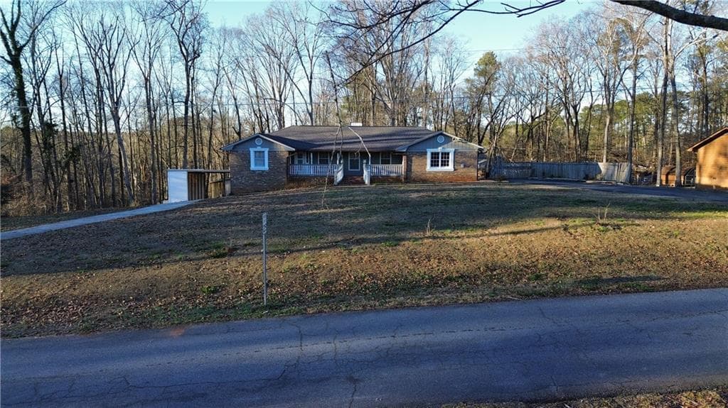 5 bedroom, 4 bathroom, 3,471 sq ft single family residence sold at 1558 Pine Circle, Lawrenceville, GA 30044