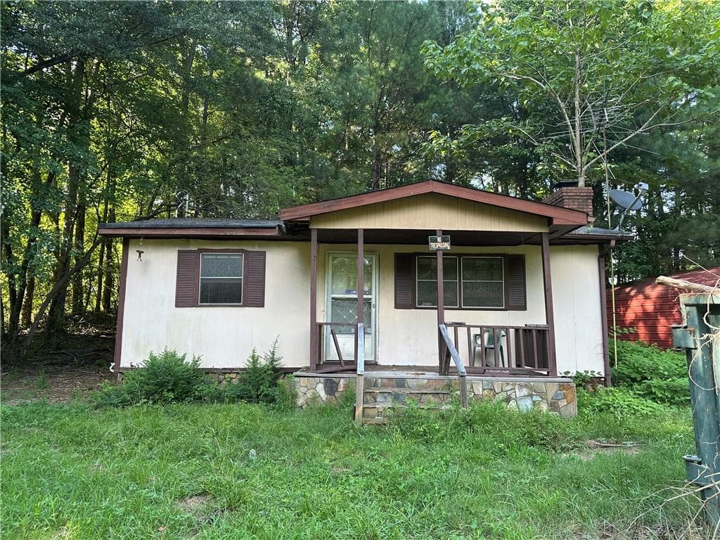 2 bedroom, 1 bathroom, 870 sq ft single family residence sold at 2530 Roper Road, Cumming, GA 30028
