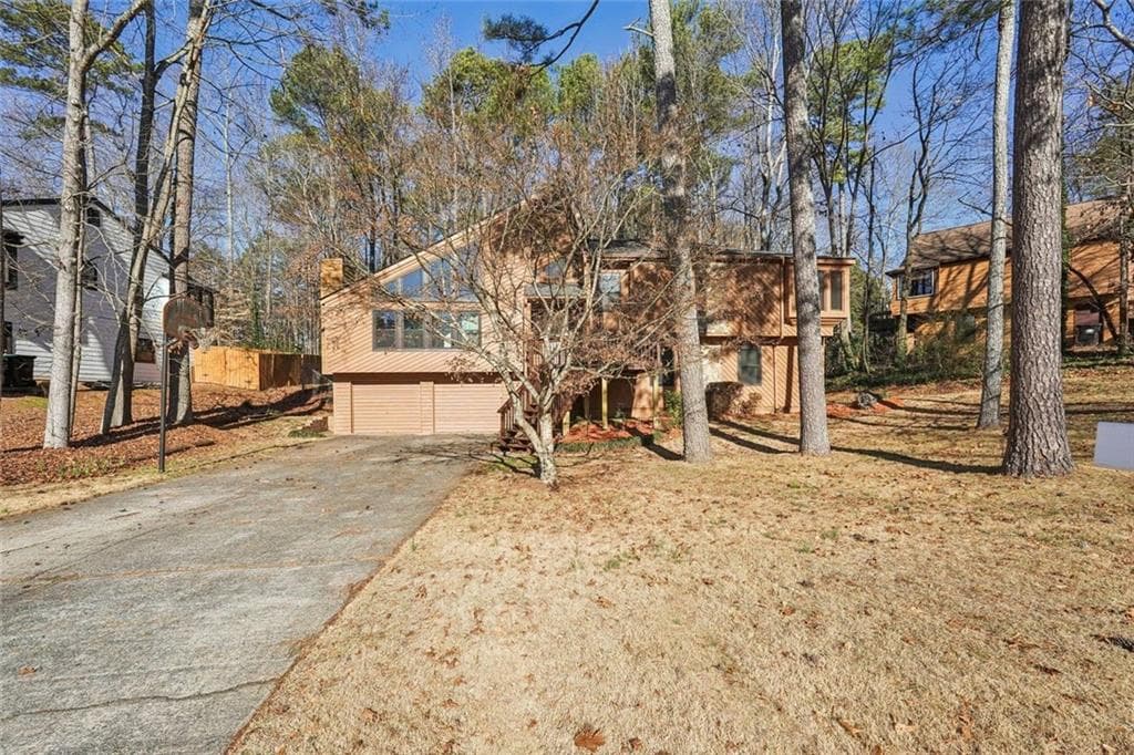 4 bedroom, 3 bathroom, 3,142 sq ft single family residence sold at 2155 Deep Woods Way, Marietta, GA 30062