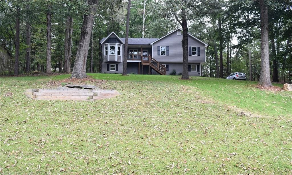 3 bedroom, 2 bathroom single family residence sold at 215 Lori Lane, Canton, GA 30114