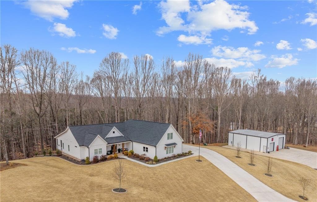 4 bedroom, 4 bathroom, 3,742 sq ft single family residence sold at 353 Newt Green Road, Cumming, GA 30028