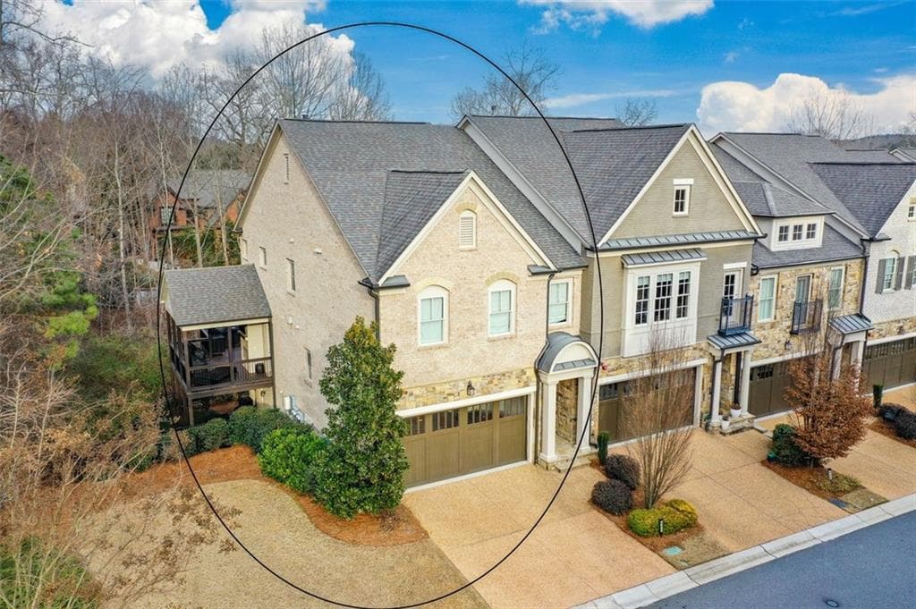 3 bedroom, 4 bathroom, 3,306 sq ft townhouse for sale at 601 Abbington River Lane, Atlanta, GA 30339