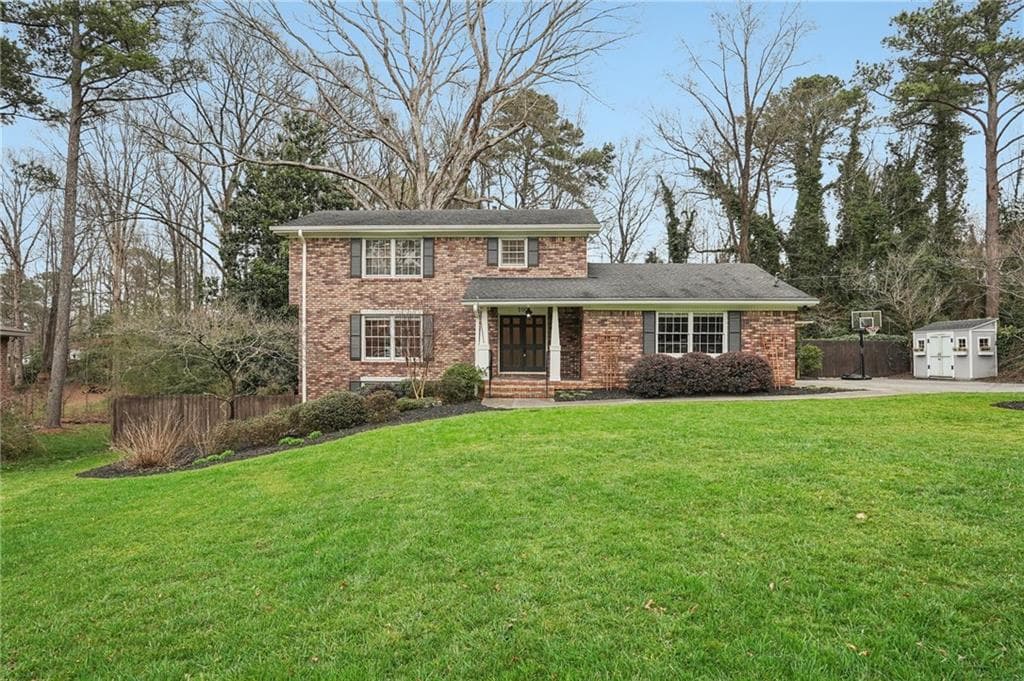 4 bedroom, 3 bathroom, 2,515 sq ft single family residence sold at 100 Westwood Drive, Marietta, GA 30064