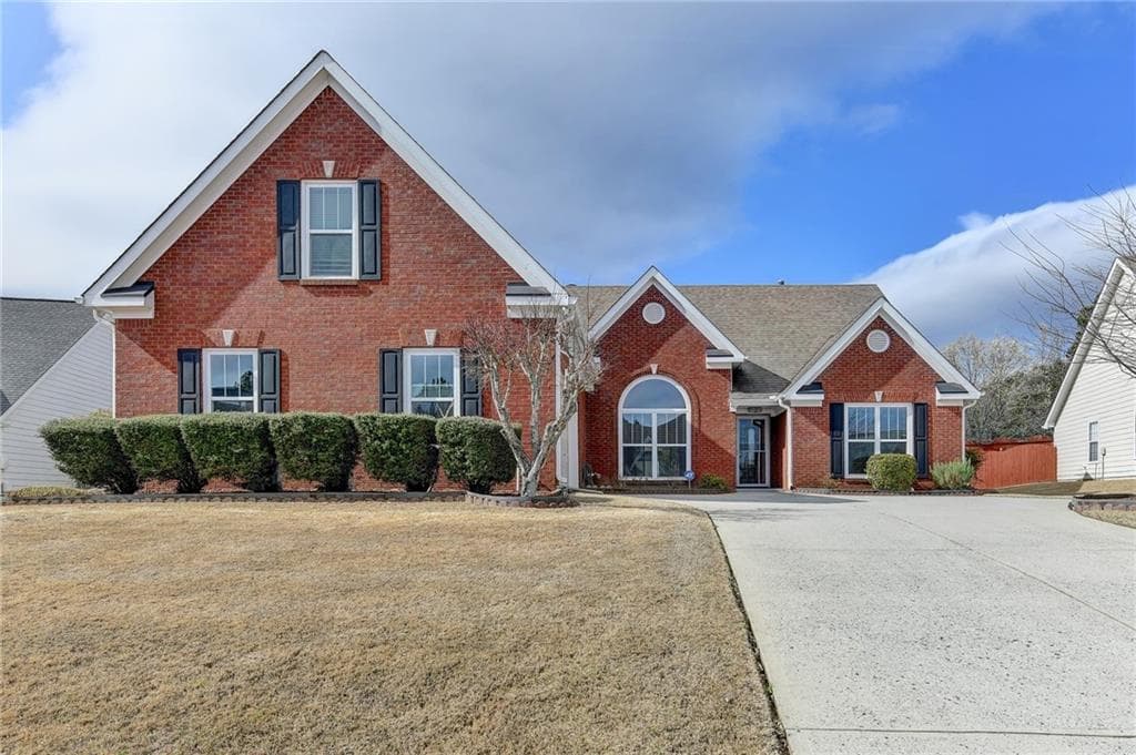 4 bedroom, 2 bathroom, 2,613 sq ft single family residence sold at 446 Canterbury Place Drive, Suwanee, GA 30024