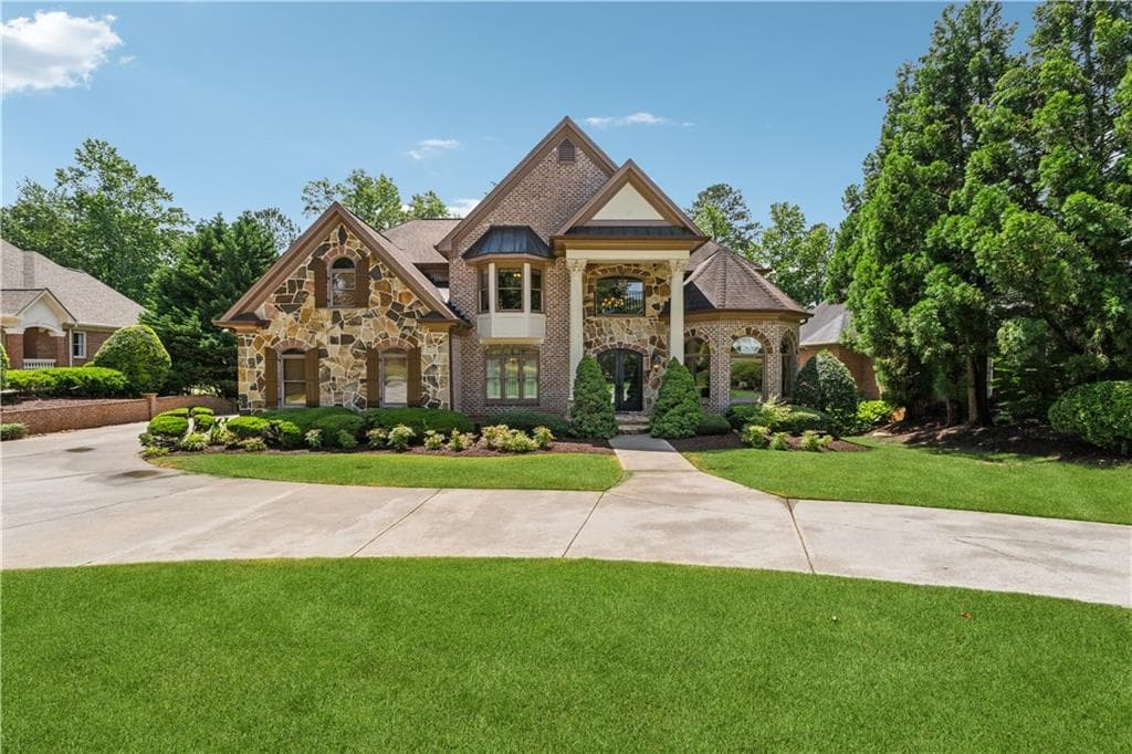 5 bedroom, 5 bathroom, 7,843 sq ft single family residence under contract at 6935 Wakehurst Place, Cumming, GA 30040