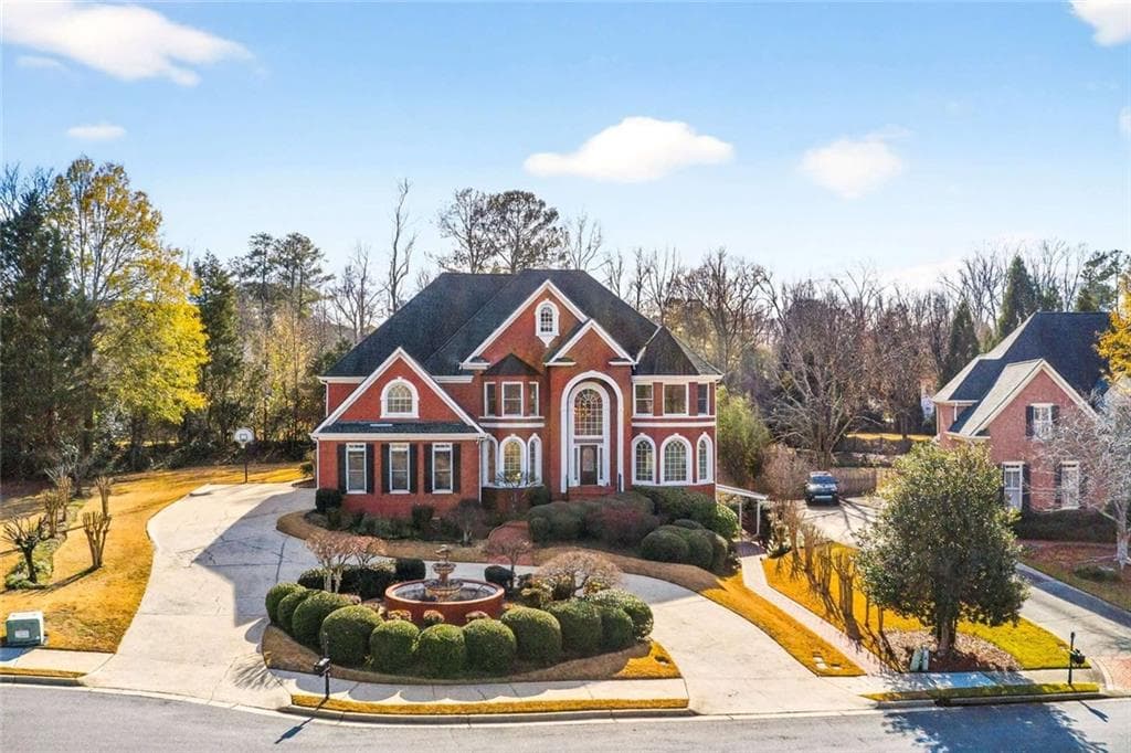 6 bedroom, 7 bathroom, 7,533 sq ft single family residence sold at 235 Summerhouse Lane, Sandy Springs, GA 30350