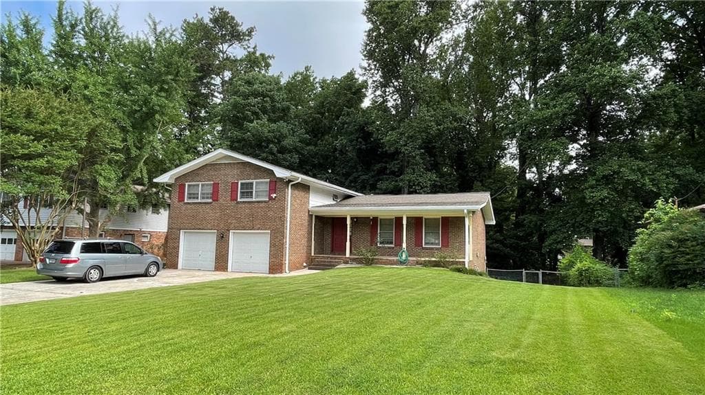 4 bedroom, 3 bathroom, 2,200 sq ft single family residence sold at 2071 Carthage Road, Tucker, GA 30084