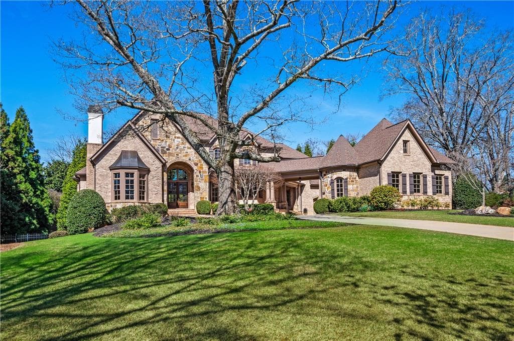 6 bedroom, 8 bathroom, 8,800 sq ft single family residence sold at 130 Manor Lake Court, Milton, GA 30004