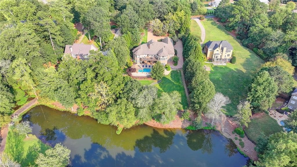 5 bedroom, 7 bathroom, 8,540 sq ft single family residence sold at 2850 Roanoke Road, Cumming, GA 30041