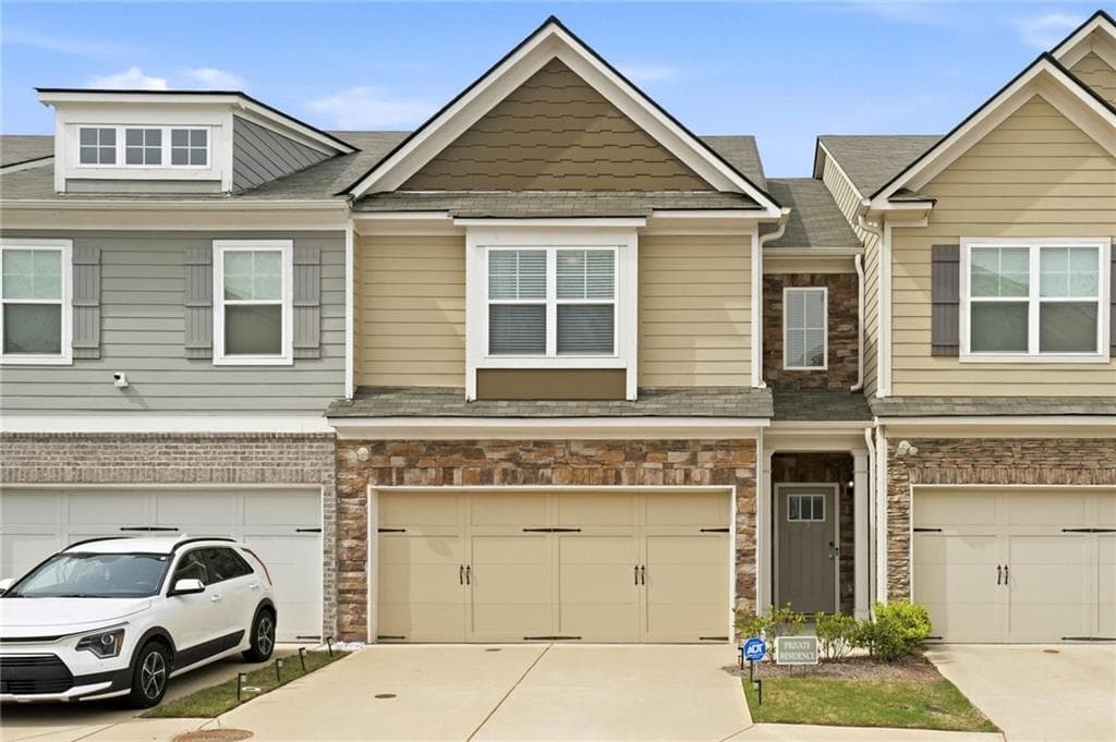 3 bedroom, 3 bathroom, 1,983 sq ft townhouse for sale at 7757 Medieval Street, Fairburn, GA 30213