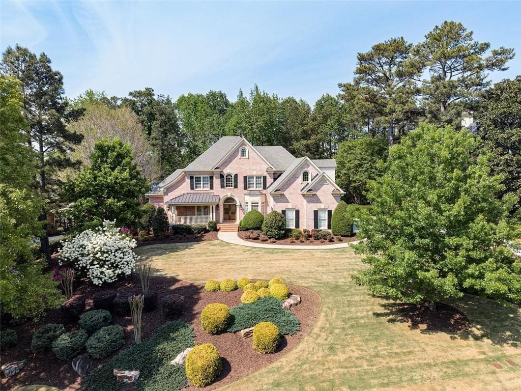 5 bedroom, 8 bathroom, 6,338 sq ft single family residence sold at 3150 Sugarloaf Club Drive, Duluth, GA 30097