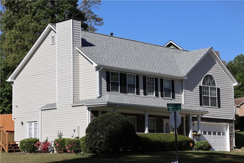 4 bedroom, 3 bathroom, 2,366 sq ft single family residence sold at 3353 Oak Vista Way, Lawrenceville, GA 30044
