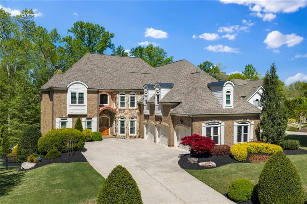 6 bedroom, 8 bathroom, 8,203 sq ft single family residence sold at 14108 Triple Crown Drive, Milton, GA 30004