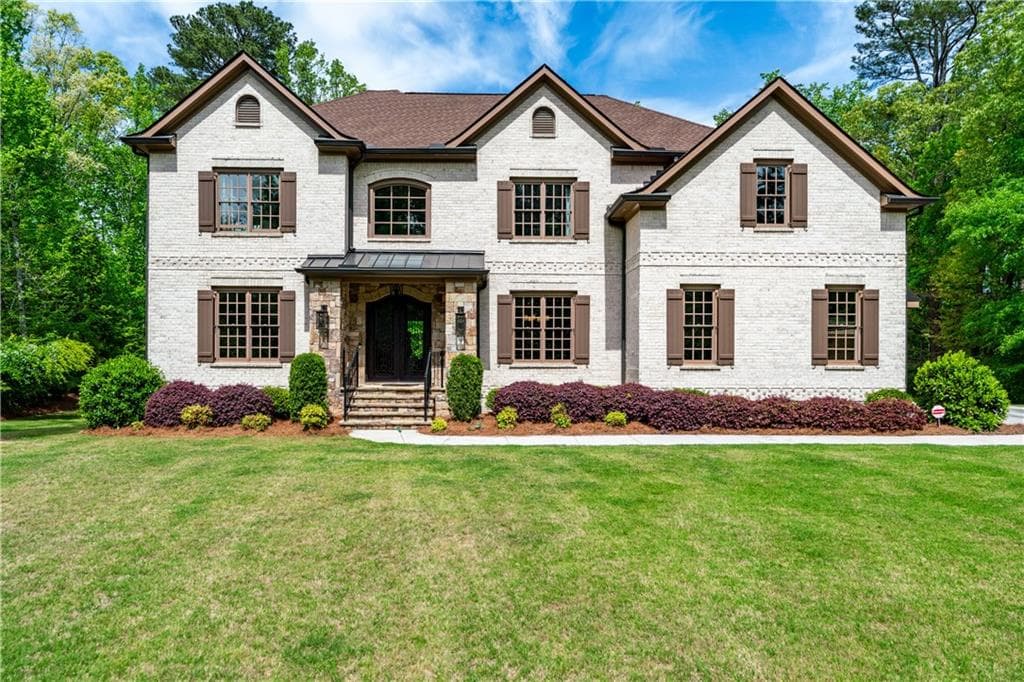 6 bedroom, 7 bathroom, 6,300 sq ft single family residence for sale at 9450 Prestwick Club Drive, Johns Creek, GA 30097