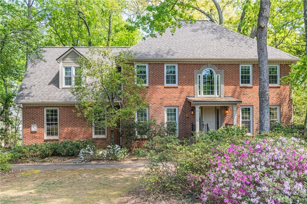 6 bedroom, 4 bathroom, 3,612 sq ft single family residence sold at 12065 Magnolia Crescent Drive, Roswell, GA 30075