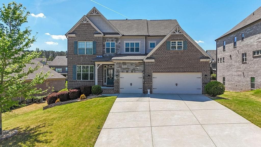 5 bedroom, 4 bathroom, 3,382 sq ft single family residence sold at 4154 Hawking Drive, Buford, GA 30518
