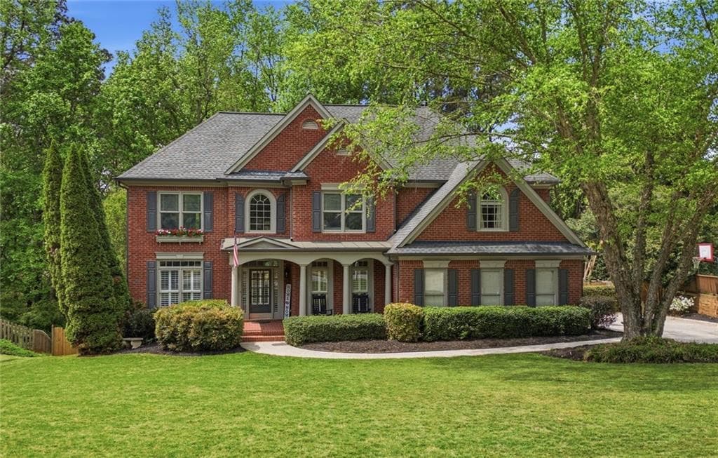 6 bedroom, 5 bathroom, 4,275 sq ft single family residence sold at 5230 Woodleaf Drive, Cumming, GA 30040
