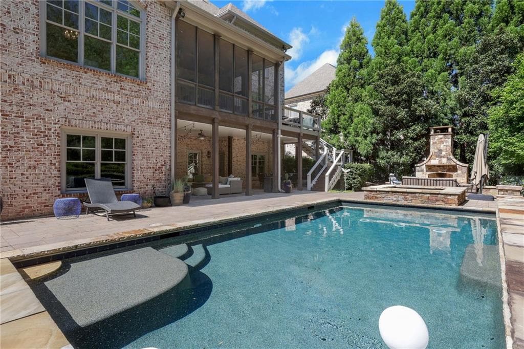 6 bedroom, 7 bathroom, 7,065 sq ft single family residence for sale at 1670 Cone Flower Way, Suwanee, GA 30024