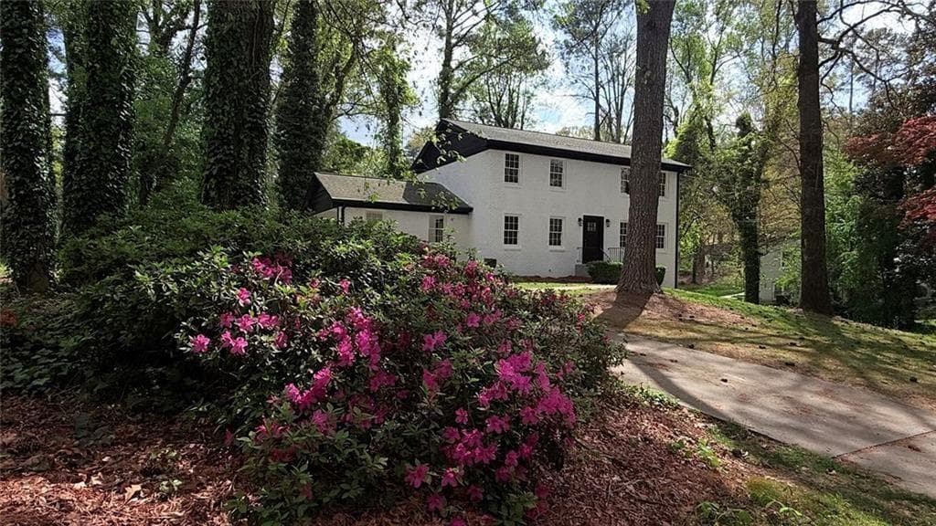 5 bedroom, 4 bathroom, 3,055 sq ft single family residence sold at 1344 Oakcrest Drive, Atlanta, GA 30311