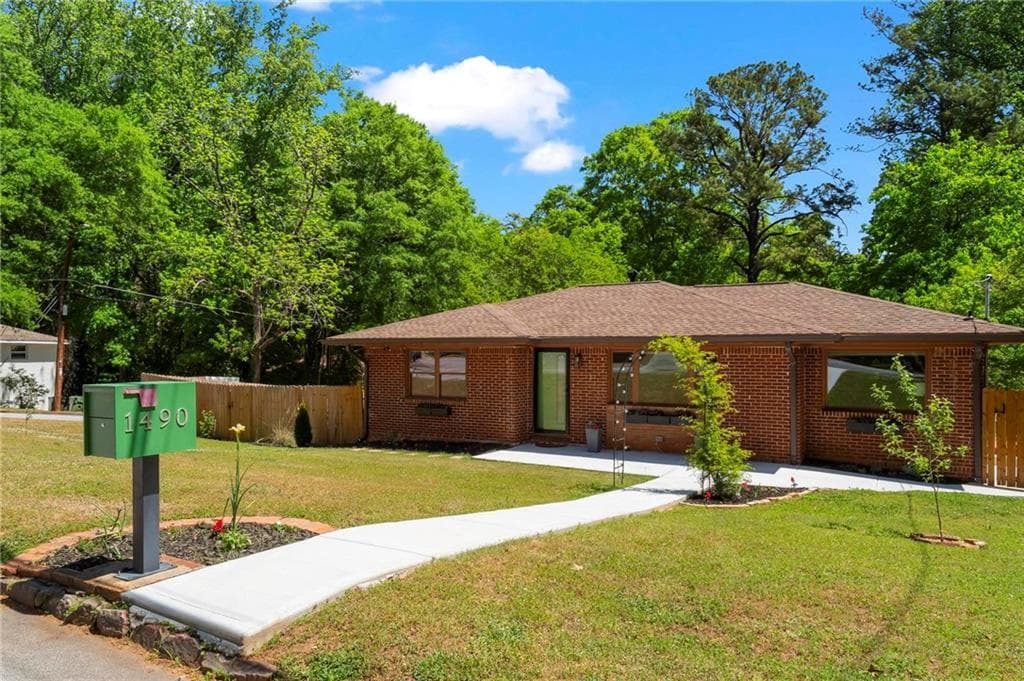 4 bedroom, 3 bathroom, 2,200 sq ft single family residence sold at 1490 Woodland Avenue, Atlanta, GA 30316