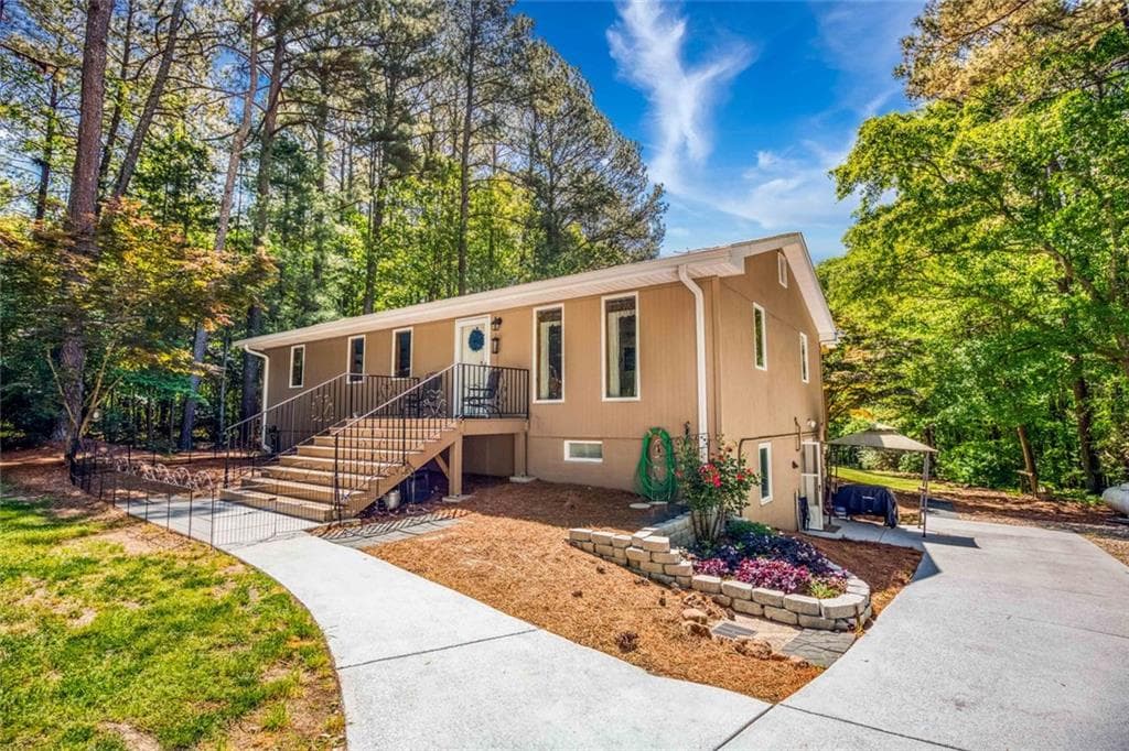 4 bedroom, 4 bathroom, 2,726 sq ft single family residence sold at 2711 Tribble Mill Road, Lawrenceville, GA 30045