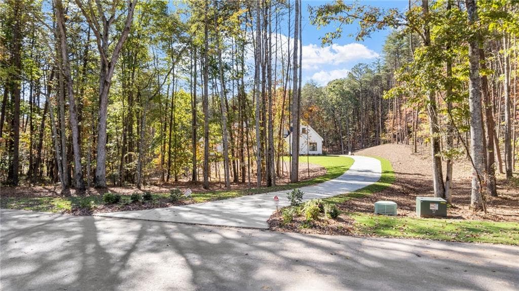5 bedroom, 5 bathroom, 6,149 sq ft single family residence sold at 165 Highlands Chase, Ball Ground, GA 30107