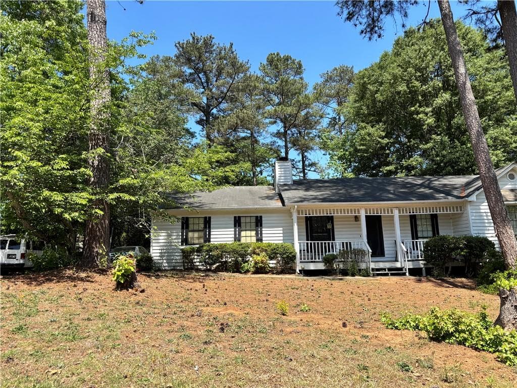3 bedroom, 2 bathroom, 1,465 sq ft single family residence for sale at 2653 W Regal Court, Lawrenceville, GA 30044